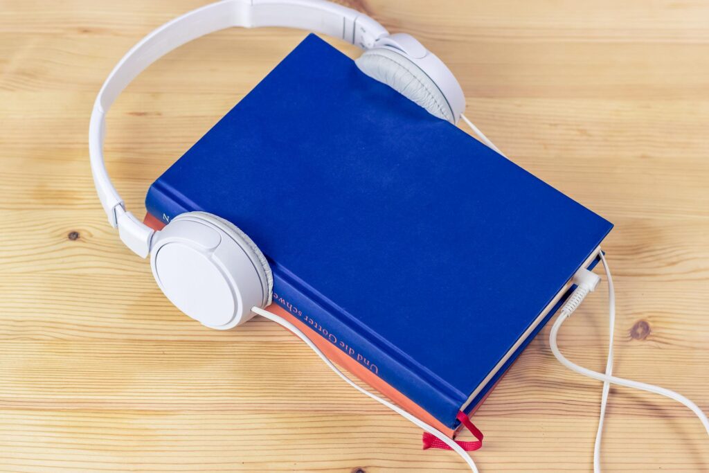 Print book with headphones and power cord.
